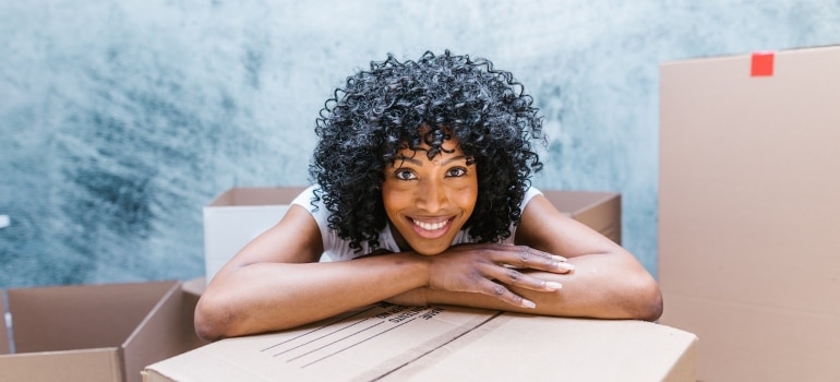 a happy girl that followed the unpacking order after your Austin move